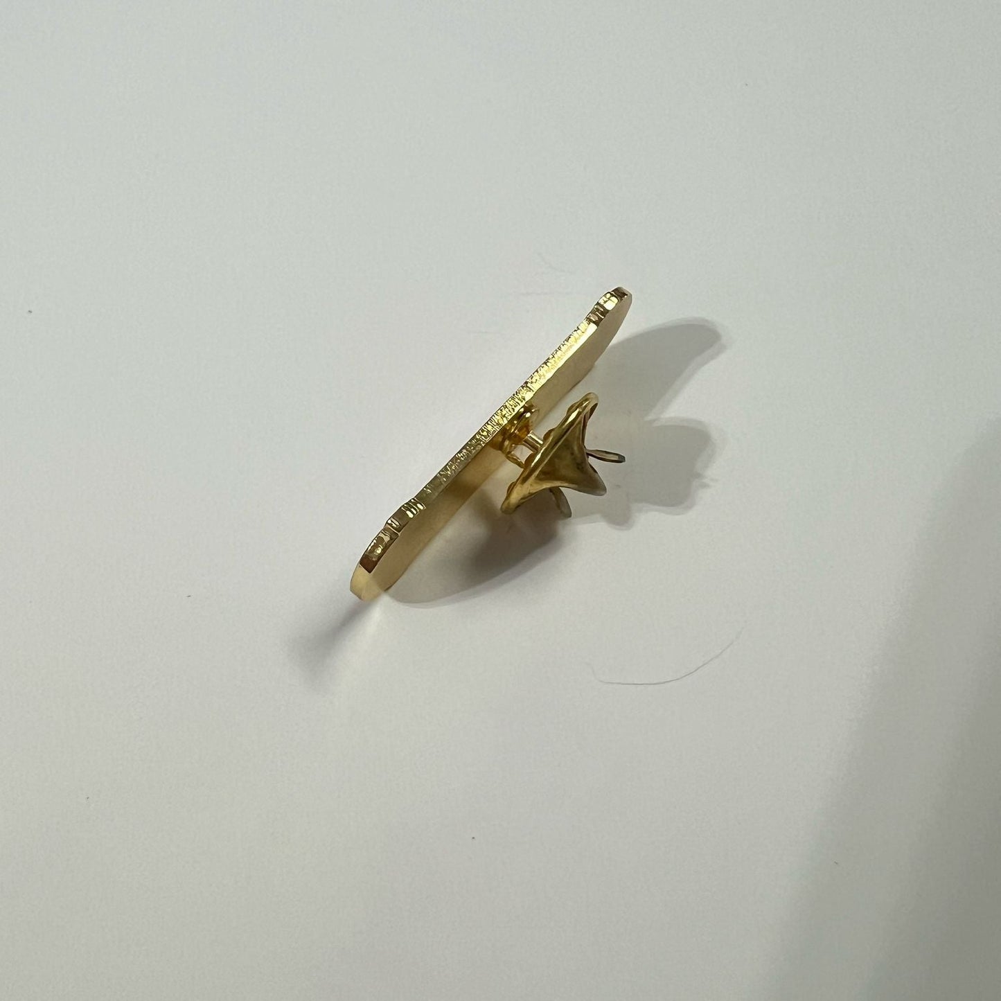 Barber pole pin