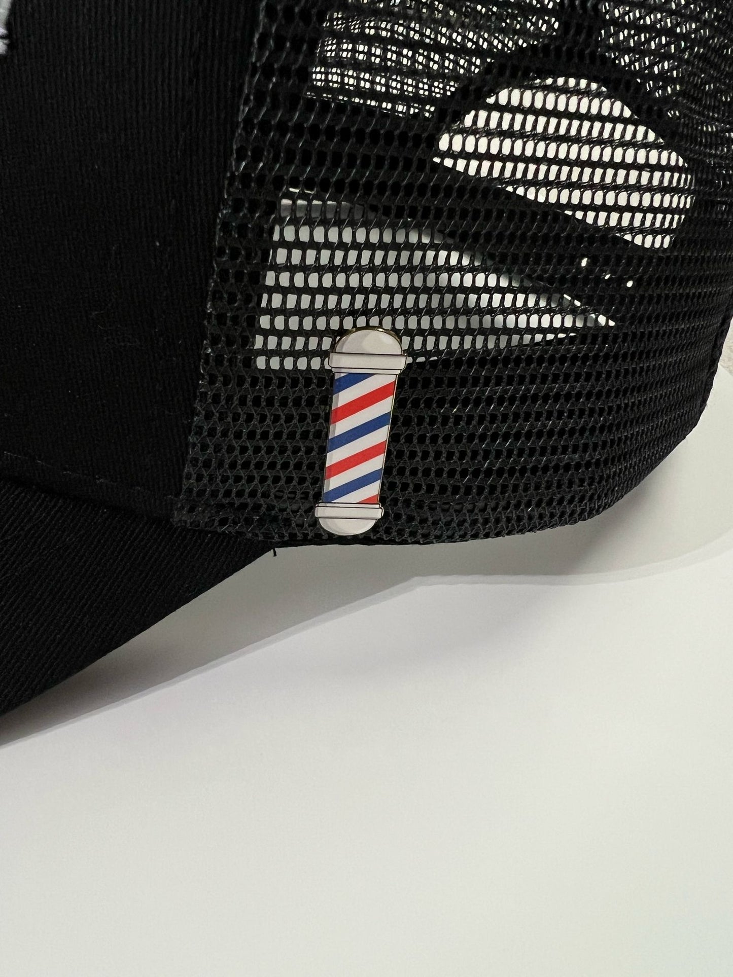 Barber pole pin